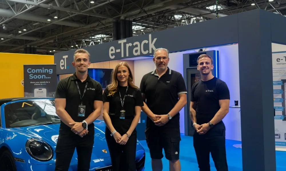 group-photo-in-front-of-stand