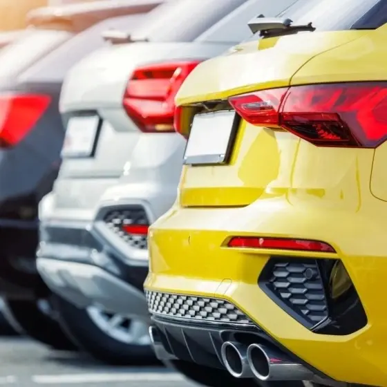Vehicles lined up at a dealership