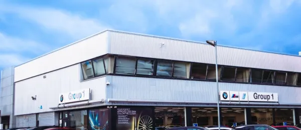 BMW dealership exterior at Stansted with parked vehicles