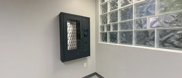 e-Track e50 Electronic Key Cabinet wall mounted to a Utility customer building