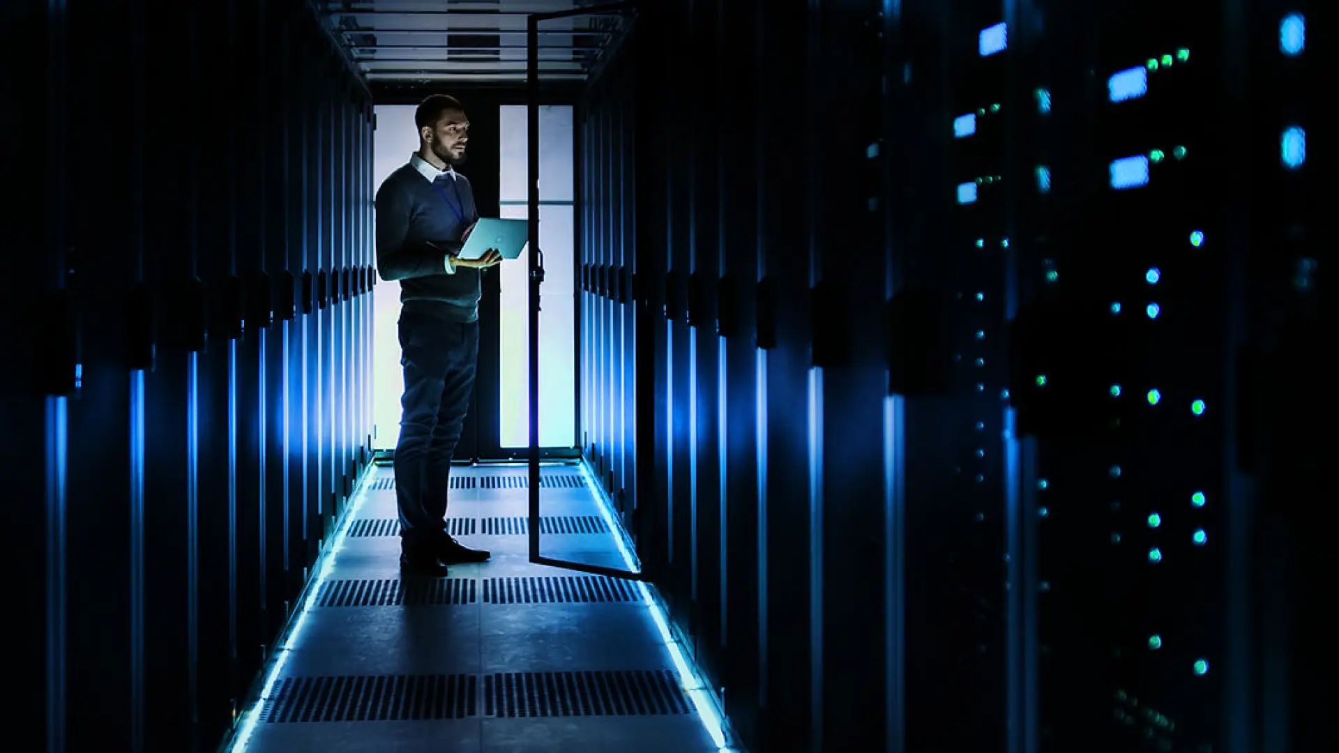 server room with an officer cross checking the data