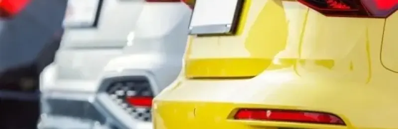 Vehicles lined up at a dealership