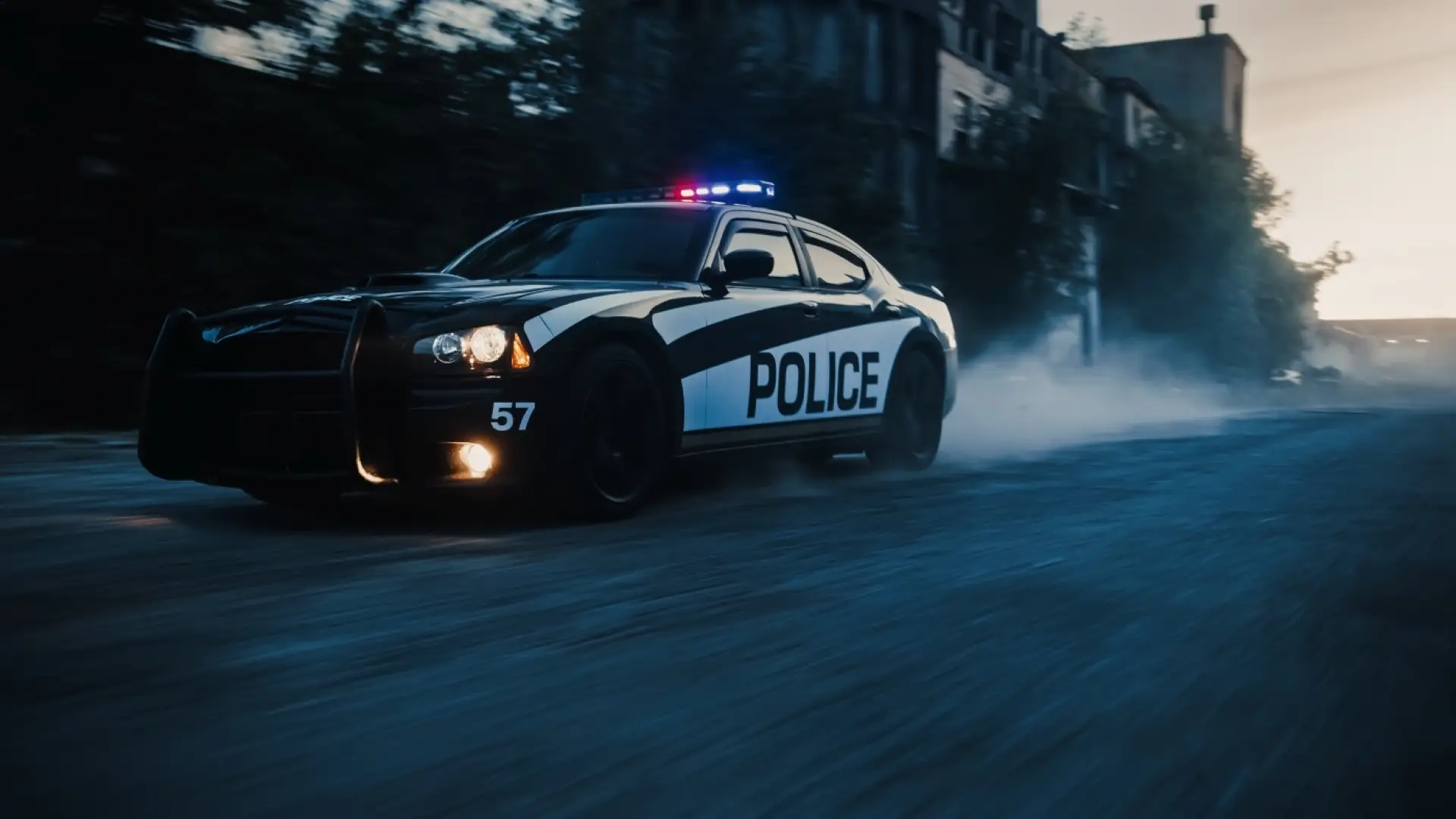 Police car driving quickly down the road